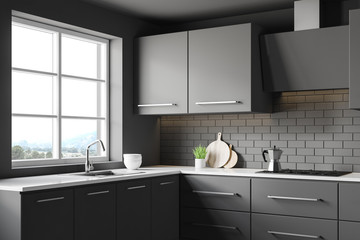 Dark grey kitchen corner with countertops