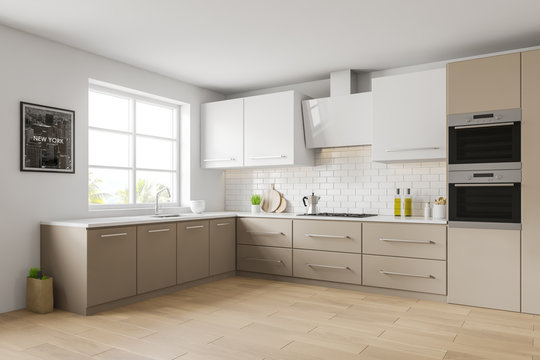 White and beige kitchen corner, counters, picture