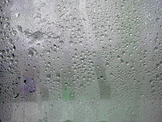 Frozen glass. Water drops