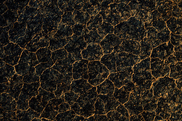 Dark golden glowing background with interesting texture. Random elements pattern in high resolution. Backdrop for different projects.