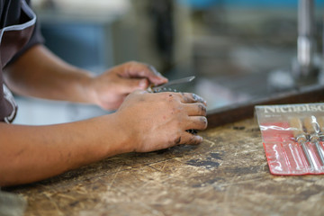 Preventive machine maintenance and retrofit in machine shop.