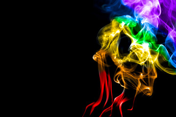 Colorful smoke on dark background.