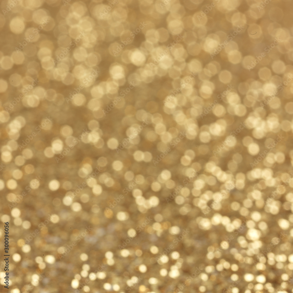 Wall mural gold abstract background with bokeh defocused lights