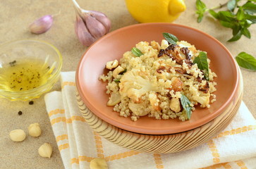 Baked cauliflower, quinoa and hazelnut salad