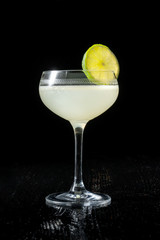 Classic daiquiri on the dark background. Luxury craft drink.