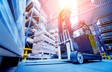 Forklift loader in storage warehouse ship yard. Distribution products. Delivery. Logistics....