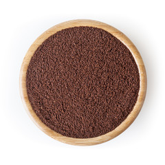 Ground roasted coffee beans in wooden bowl isolated on white background with clipping path