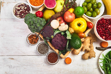 Healthy balanced vegan dieting concept.  Vegetables fruit seeds beans ingredients for cooking. Organic vegetables, detox diet, close up. Top view. Flat lay. Copy space. Free for text..