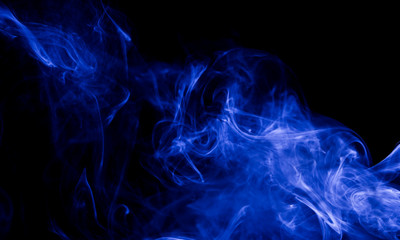 Blue smoke on black background