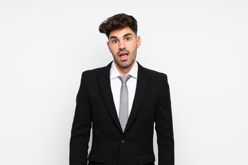 Young businessman over isolated white background with surprise facial expression