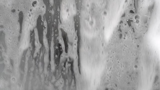 4k Video of industrial washing machine is washing a big amount of textiles