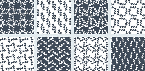 Collection seamless pattern of blue and white abstract twigs with leaves in the shape of hearts. Different compositions from one element. Vector