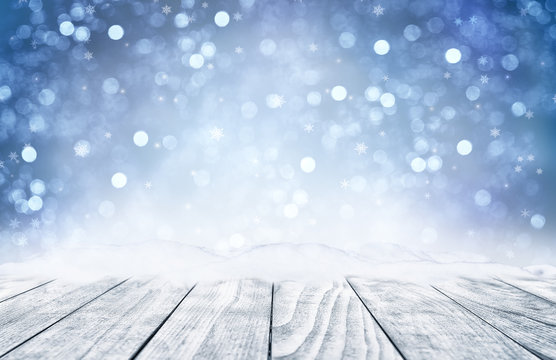 Decorative Christmas background with bokeh lights and snowflakes.