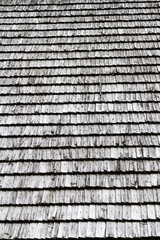 Closeup. Background. Dark wood texture. Traditional rustic wooden roof from Poland