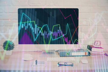 Forex graph hologram on table with computer background. Double exposure. Concept of financial markets.