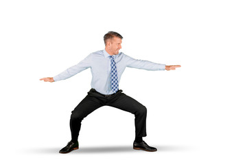 Caucasian businessman posing surfs in the studio