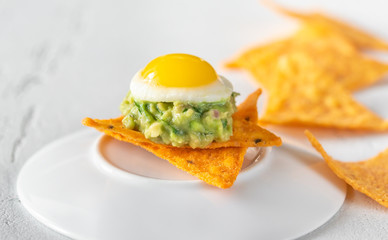 Guacamole and  quail egg appetizer