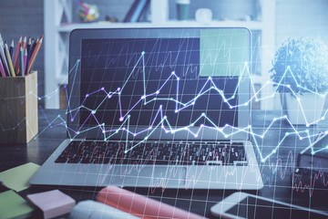 Multi exposure of chart and financial info and work space with computer background. Concept of international online trading.