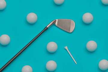 Golf balls, golf club and tee on blue background, golf concept wallpaper design