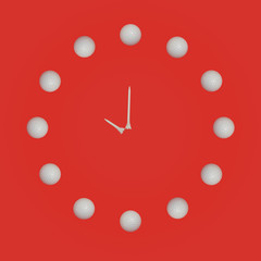 Watch with golf balls and tees, white golf balls on red background shaped as clock