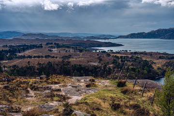 landscape rays light scotland dark clouds lake