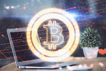 Multi exposure of blockchain theme hologram and table with computer background. Concept of bitcoin...