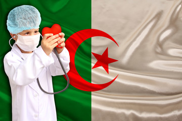 photo of beautiful colored national flag of modern african state algeria on textured fabric,...