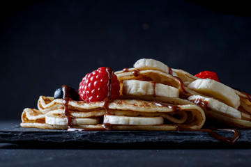 Crepe with banana, strawberry and chocolate
