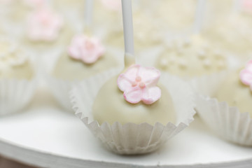 Plate of pop cake or sticky cakes. Stylish pastries as a decoration for the holidays. Sweet bar