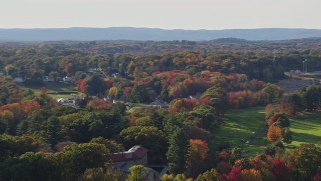 Springfield Massachusetts Aerial v8 Panoramic of country club hole and surrounding neighborhood with sunlight - October 2017
