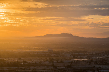 Los Angeles sunrise view across the San Fernando Valley towards Griffith Park in Southern California.  