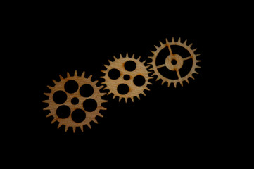 Gear mechanism on black background close up