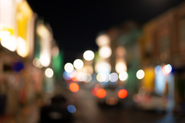 Abstract  colorful light bokeh in small town..Defocused of light street at phuket old town in the evening.