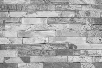 Stone cladding wall detail, background.