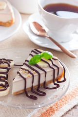 Banana cheesecake without baking on a wooden table, selective focus