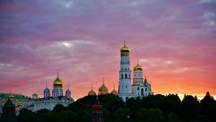 Amazing view of Moscow Kremlin at sunset with red and purple clouds