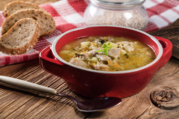 Barley soup with vegetables and chicken.