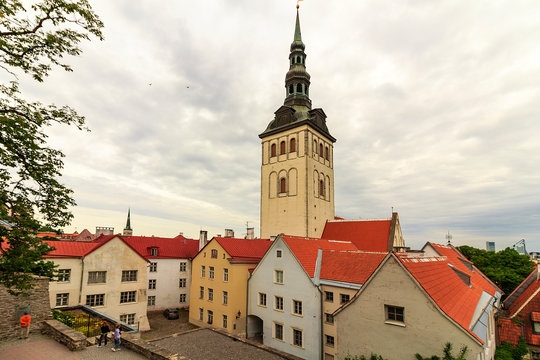 Town Hall in historic center Tallinn. Medieval stone houses. Cobblestone, cobblestone pavement. Typical architecture of Tallinn Old Town, Estonia  tower of Town hall