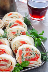 Lavash roll with red fish and cheese, selective focus