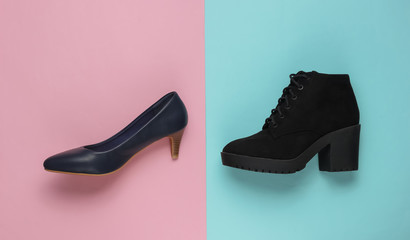 Leather high heel shoes and boots on a colored pastel background. Minimalistic fashion concept. Top view