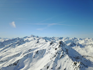 Fototapeta na wymiar Winter at alps snow and mountain peaks