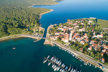 Fototapeta na wymiar Aerial view of Osor ( Ossero ) is a small town and port on the Cres island in Croatia. It is lies at a narrow channel that separates islands Cres and Lošinj. 