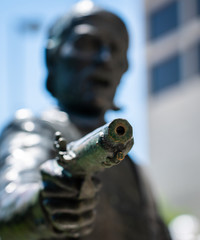 San Antonio Statue with gun