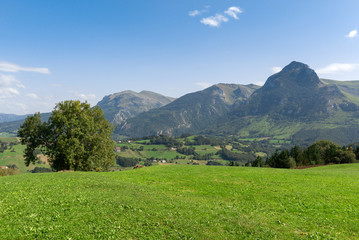 Fototapeta na wymiar Panorama of Goierri from Lazkaomendi with Txindoki mountain as background, Basque Country, Spain