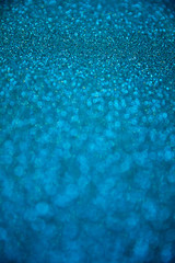 A stunning Christmas background, a Christmas background with magic sparkles and glowing powder of different colors, decorations for a higher event for the New Year and Christmas, a cozy home atmospher