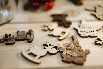 Christmas tree decorations, deer and gnomes made of wood