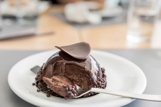 Dark chocolate cupcake  on spoon. Stock image.