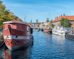 Fototapeta na wymiar Copenhagen Canal Scene with Red Barge