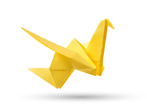 Origami flying paper bird isolated with clipping path
