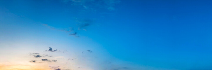 Panorama of Dramatic vibrant color with beautiful cloud of sunrise and sunset. Panoramic image.